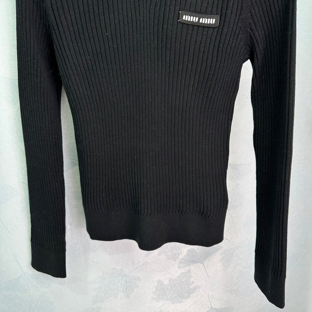 Ribbed High-Neck Wool Sweater